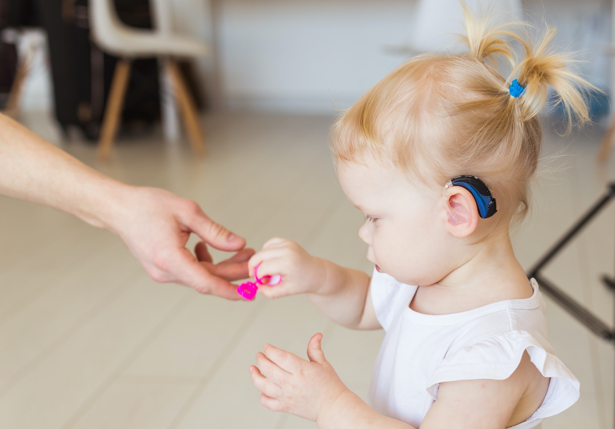 Child with hearing aid